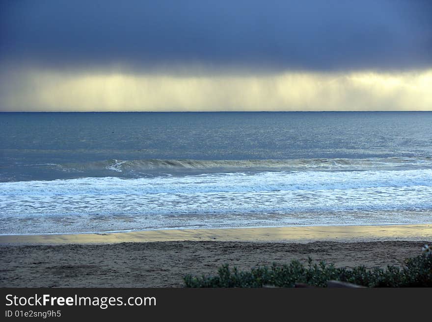 Storm Clouds over the ocean on the horizon