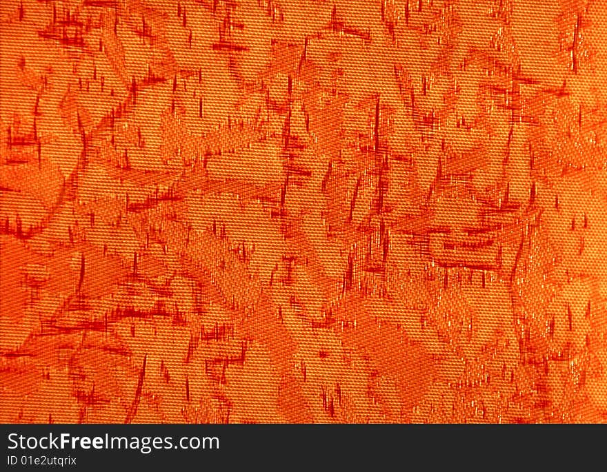 Uneven orange fabric - texture. illuminating from beneath behind an object