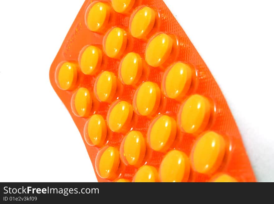 Some pills, capsules in package isolated on white. Bright, and clear.