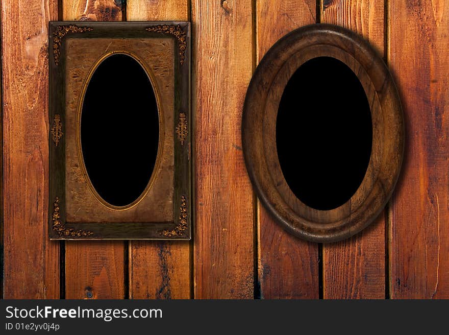 Two Wintage Photo-frames On Wooden Background