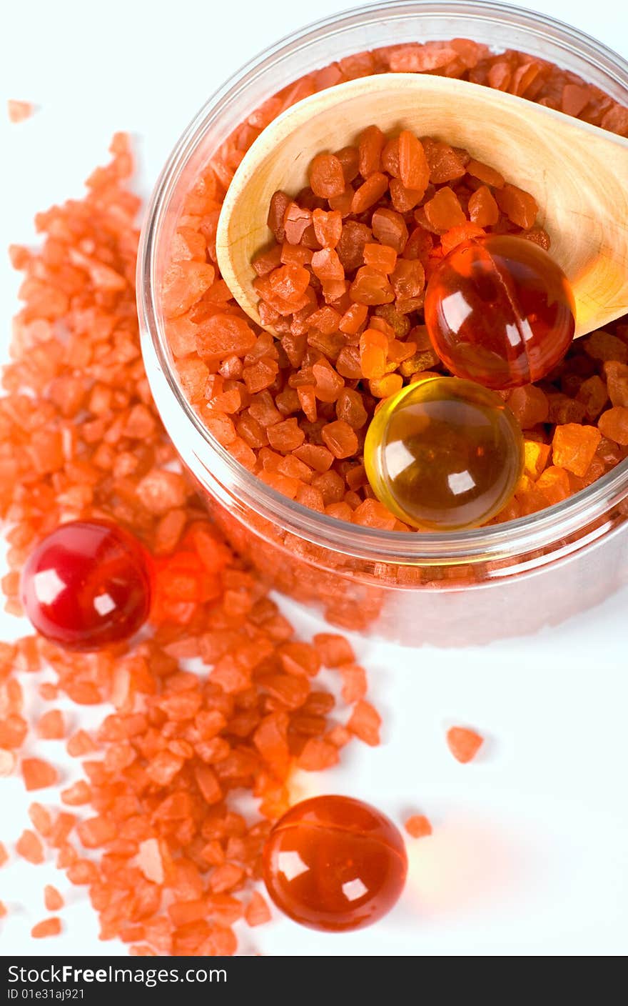 Spa products: bath salt and oil balls in a bowl