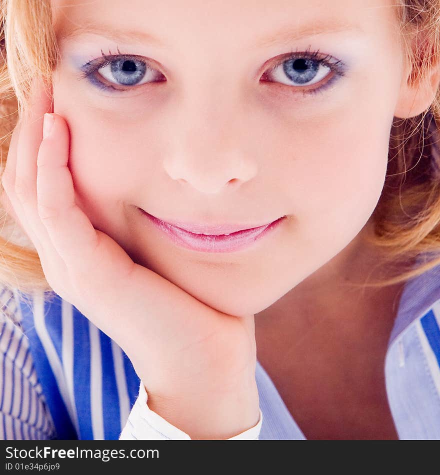 A blue fashion child showing her clothes on white. A blue fashion child showing her clothes on white