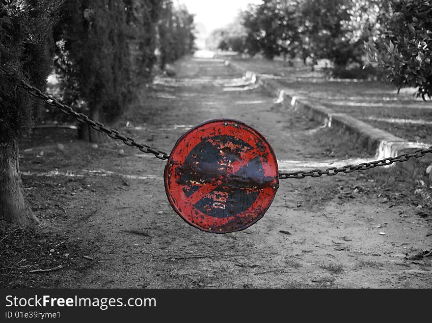 Do not pass, do not parking, chain crossing way. aged weathered signal, Spain