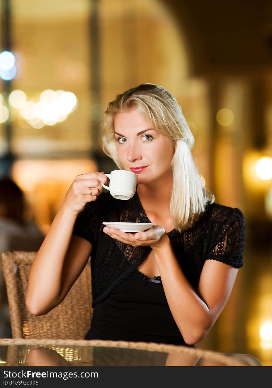 Woman drinking coffee