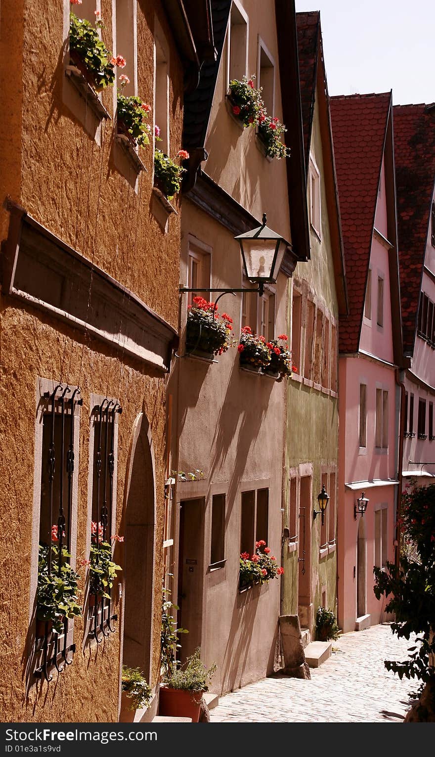 Funy colored little houses near the center of the medieval Rothenburg ob der Tauber. Funy colored little houses near the center of the medieval Rothenburg ob der Tauber