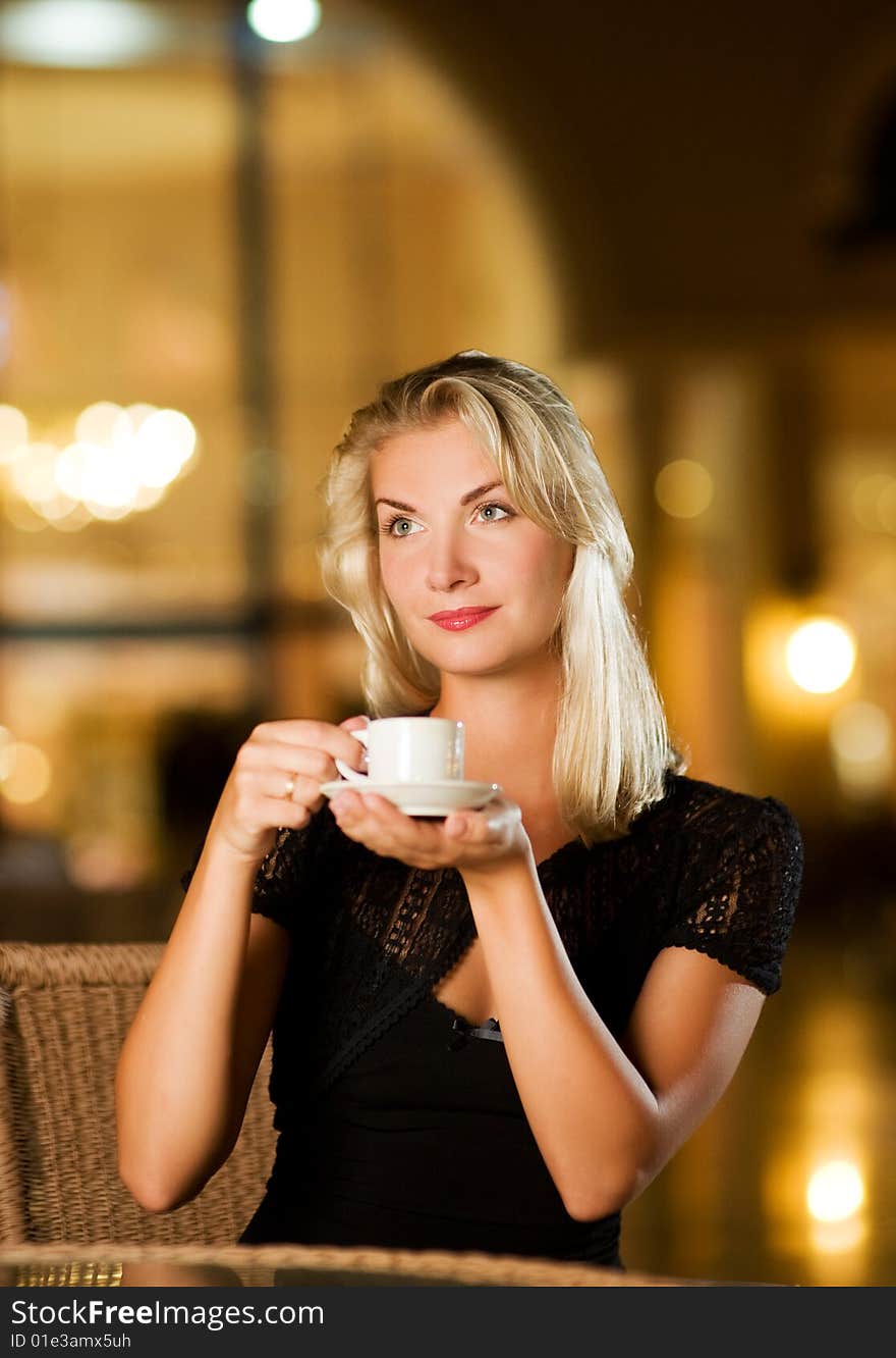 Woman drinking coffee