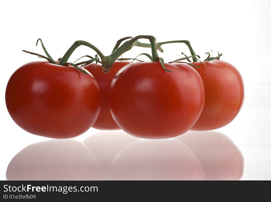 Healthy food image four fresh tomatos on the table. Healthy food image four fresh tomatos on the table