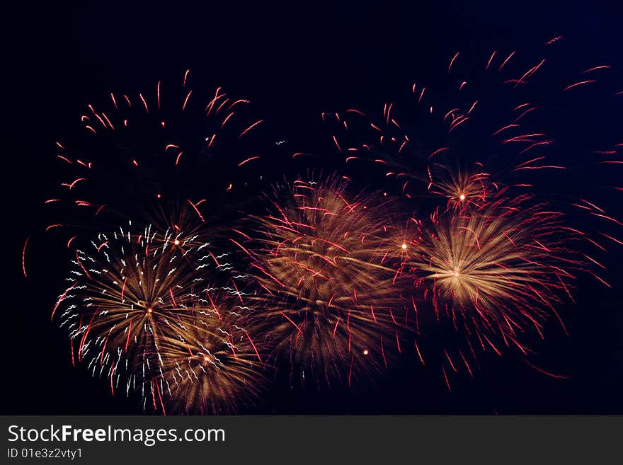 Bright colored fireworks on black background