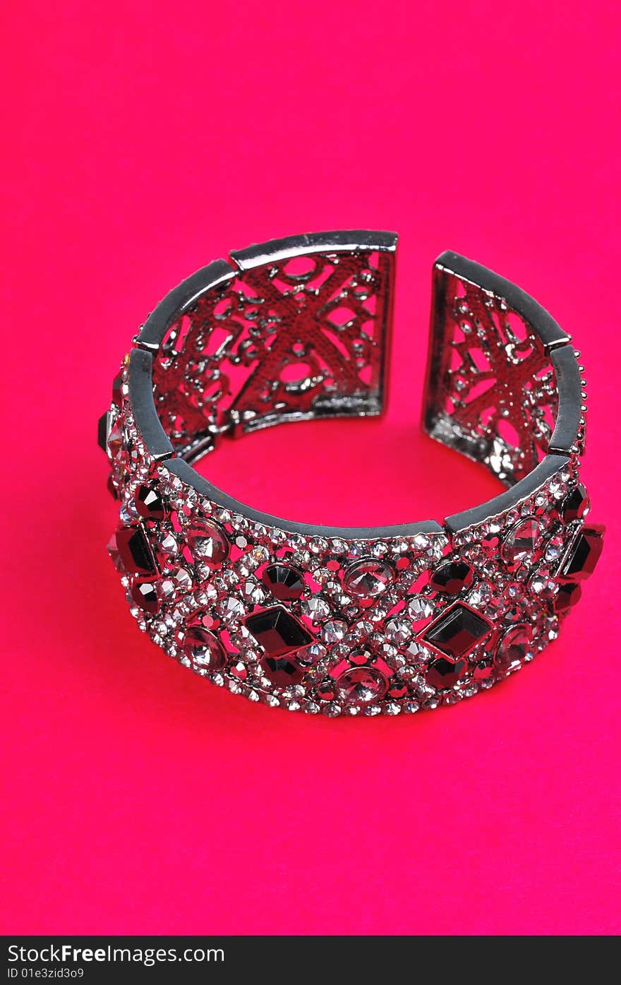 Bracelet isolated on pink background.