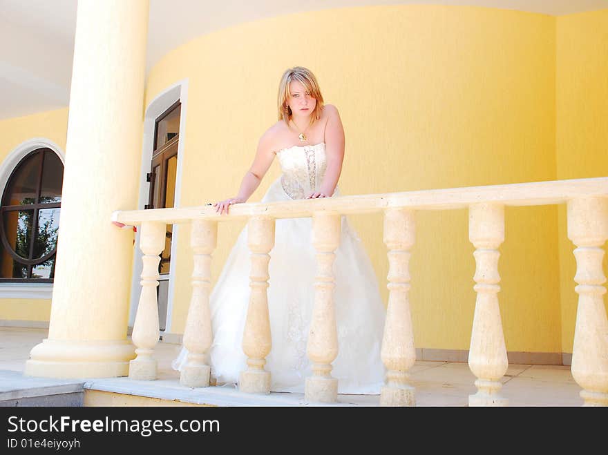 The happy girl in a wedding dress