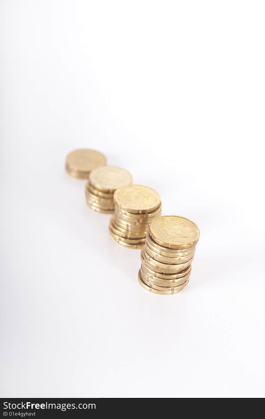 Stacked up coins. Isolated over white. Ideal Businesshot. Stacked up coins. Isolated over white. Ideal Businesshot.