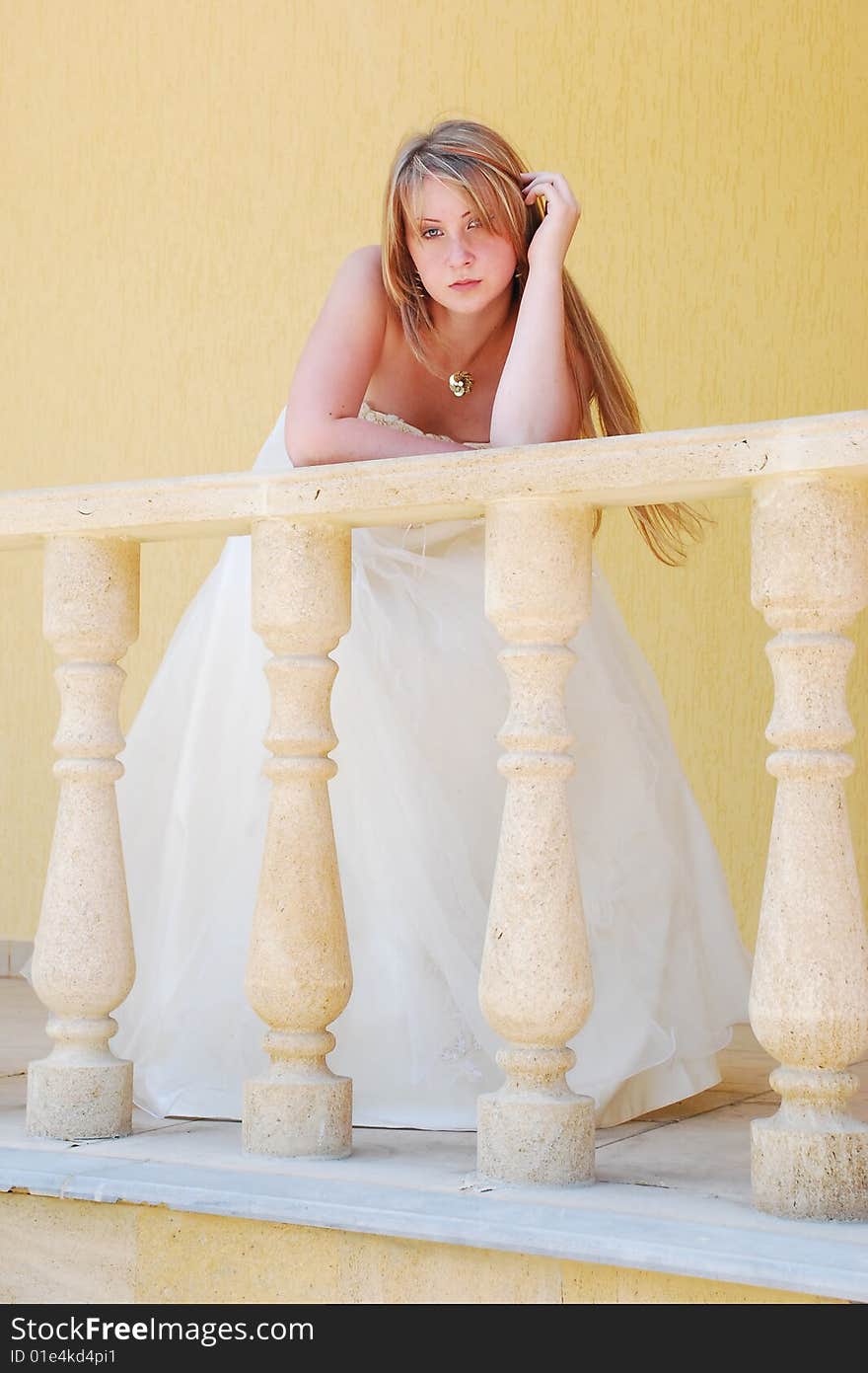 The happy girl in a wedding dress