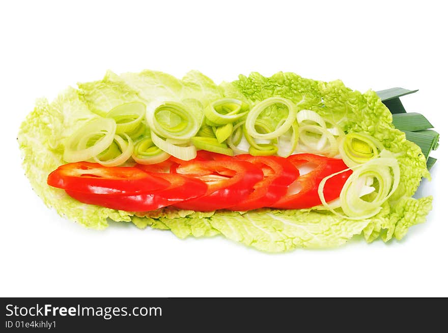 Pepper with onion lie on cabbage leaves. Pepper with onion lie on cabbage leaves