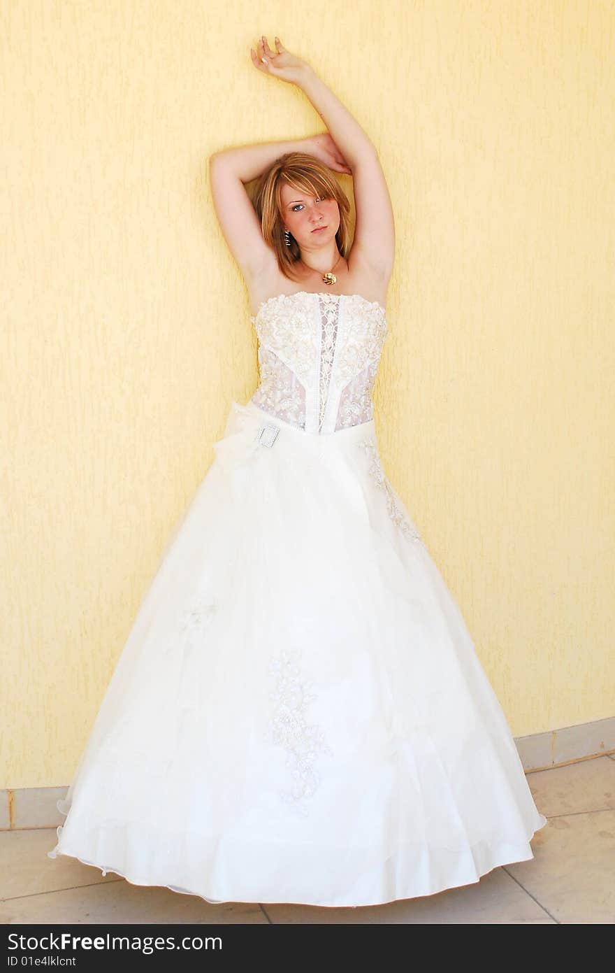 The happy girl in a wedding dress