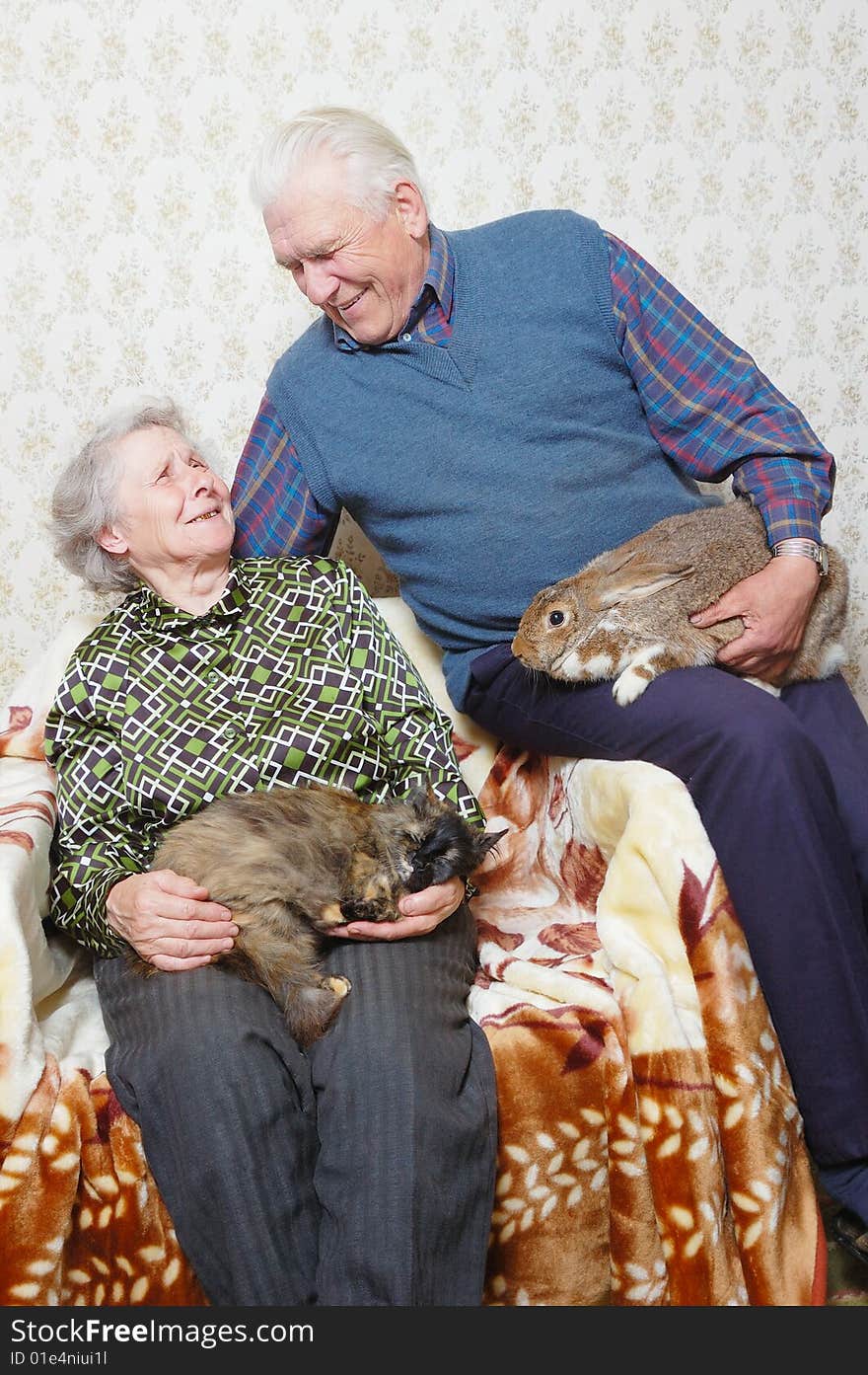 Happy husband and wife with domestic animal. Happy husband and wife with domestic animal