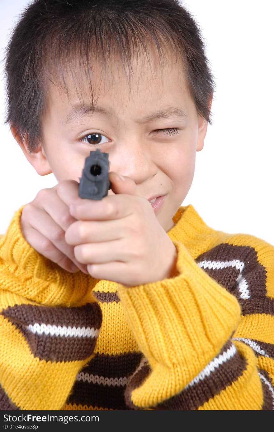 Aisa boy with gun