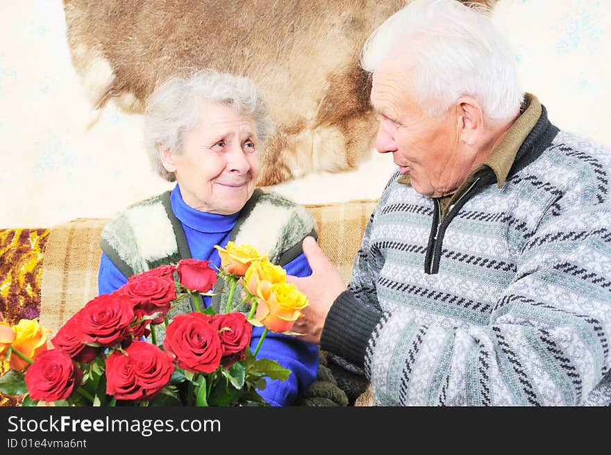 Elderly man sit near elderly woman. Elderly man sit near elderly woman
