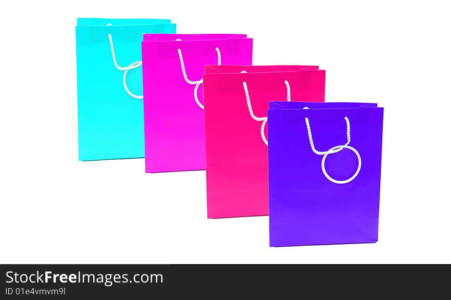 Shot of some coloured paper shopping bags on white. Shot of some coloured paper shopping bags on white