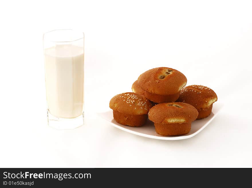 Breakfast, cake and milk with white background