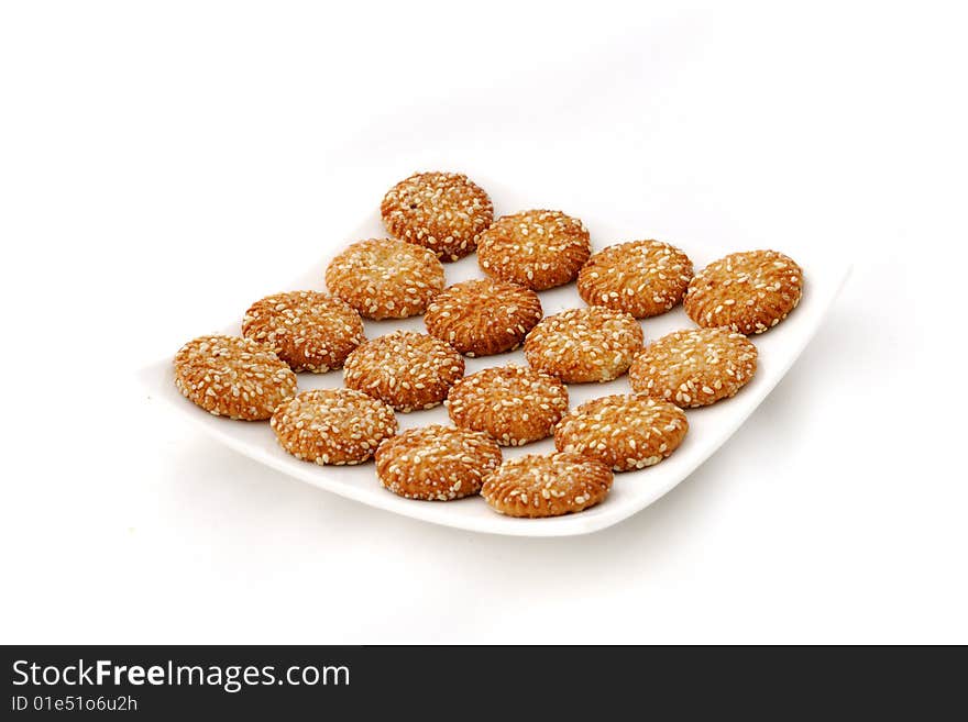 Close-up of cookies in a white plate.