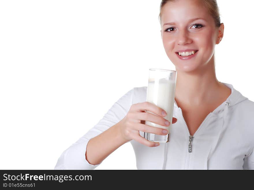 Young woman with glass of milk on white bacground