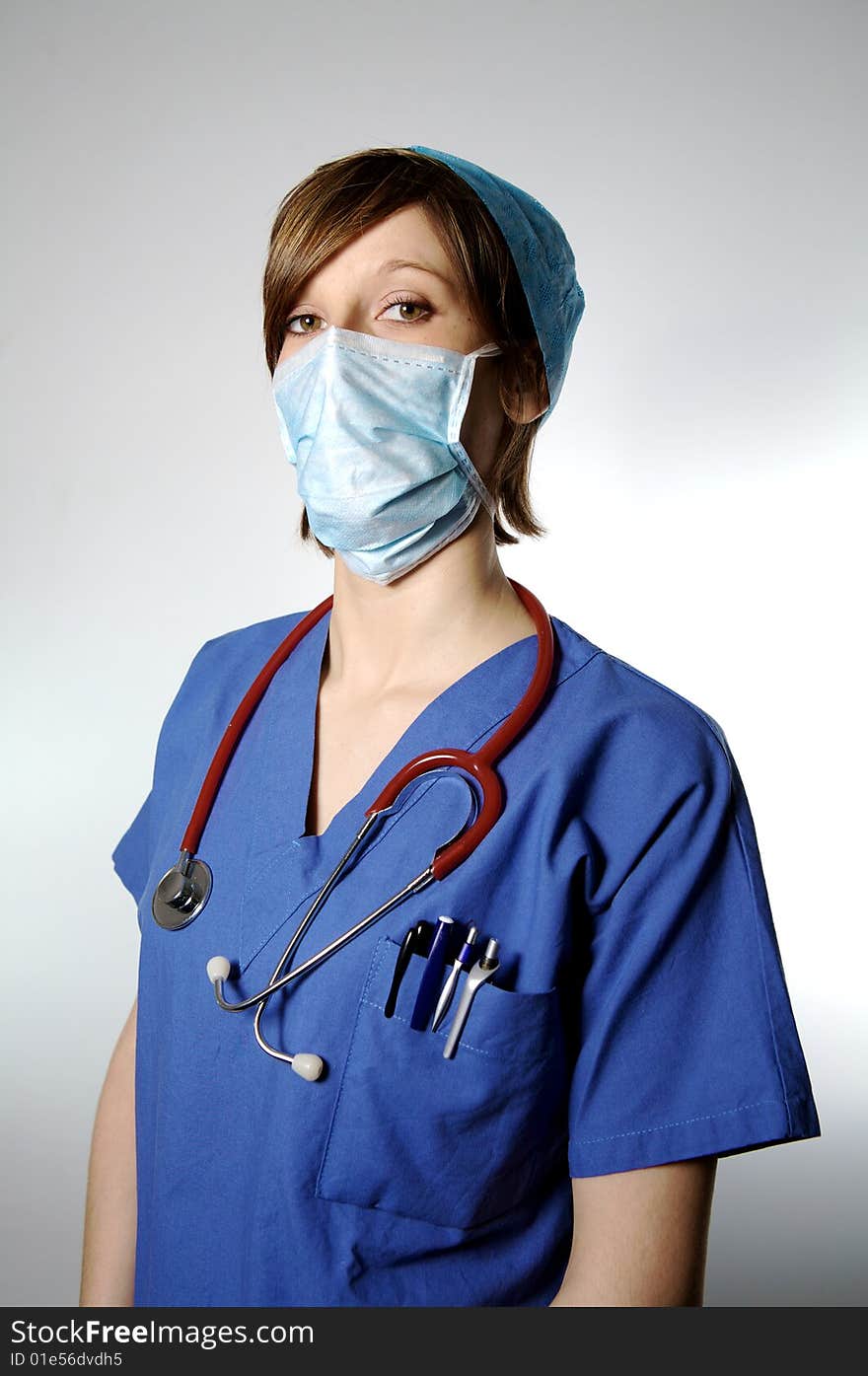 Nurse with mask and hat on a white blackground. Nurse with mask and hat on a white blackground