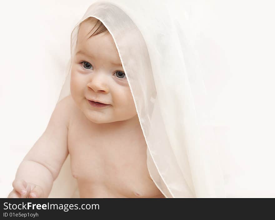 Baby smile wear white color Scarf look like Pure Angel. Baby smile wear white color Scarf look like Pure Angel