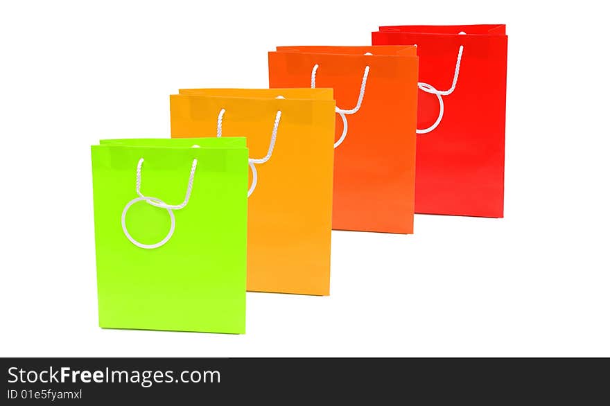 Shot of some coloured paper shopping bags on white. Shot of some coloured paper shopping bags on white