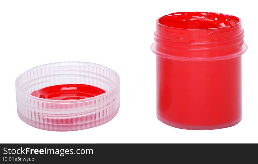 The red paint in a container with a lid