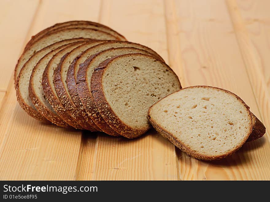 Bread On Wooden Plate