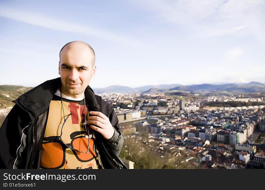 Man Close-Up Portrait On The City Background. Man Close-Up Portrait On The City Background