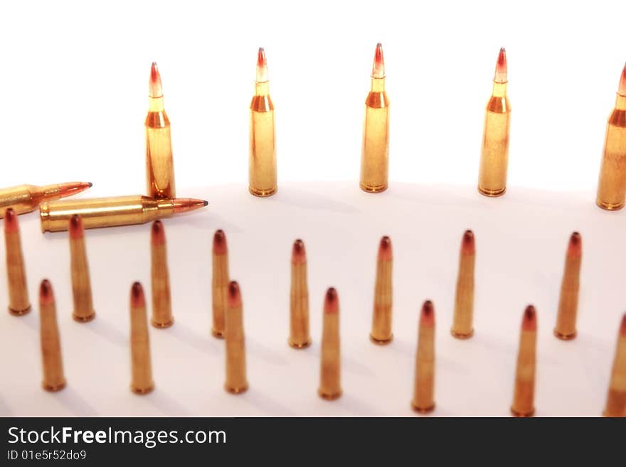 Ammunition all in rows on a mixed background. Ammunition all in rows on a mixed background