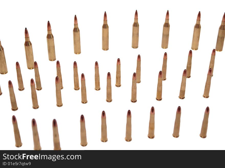 Ammunition all in rows on a mixed background. Ammunition all in rows on a mixed background