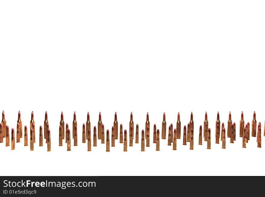 Ammunition all in rows on a white background with copyspace. Ammunition all in rows on a white background with copyspace