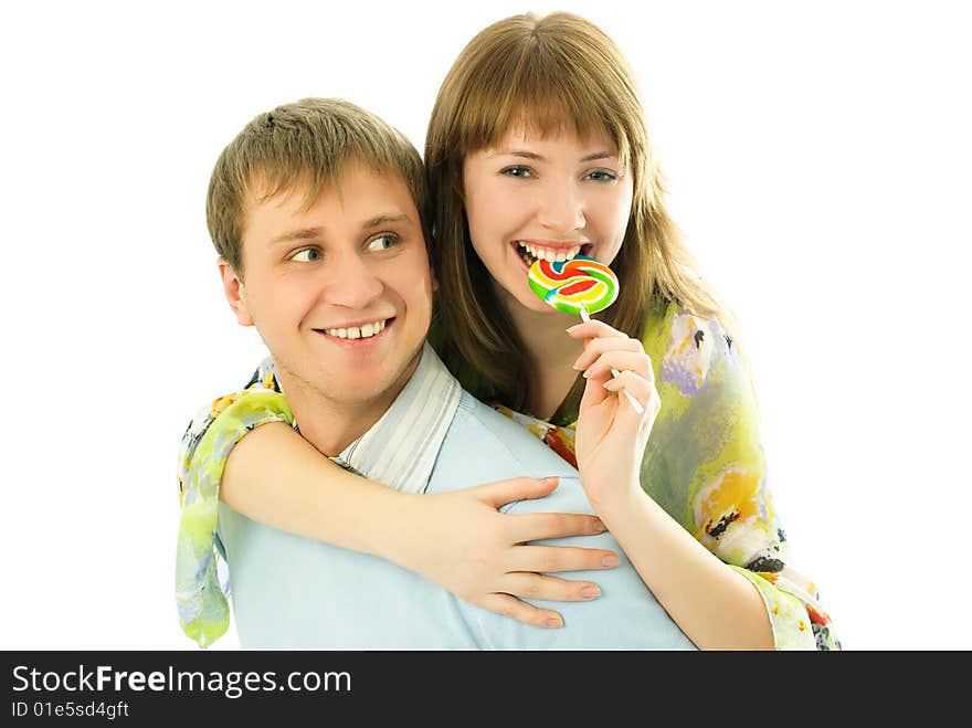 Young man giving his girlfriend piggyback ride