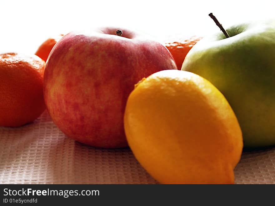 Various fruit:apple,lemon and orange,natural lighting. Various fruit:apple,lemon and orange,natural lighting.