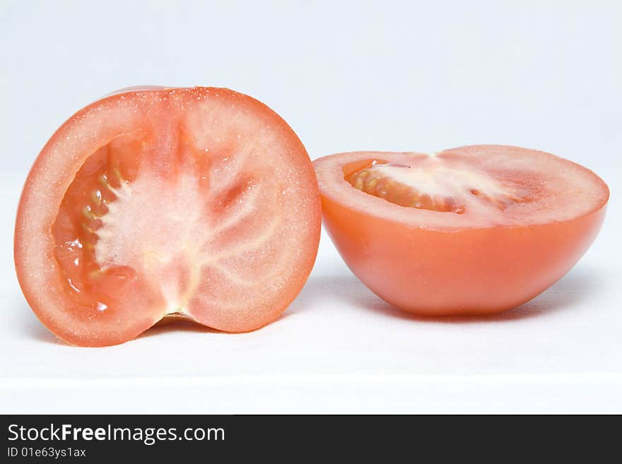 The tomato cut in the middle on two halves