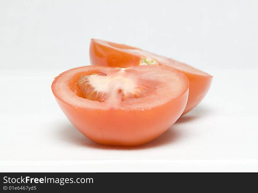 The tomato cut in the middle on two halves