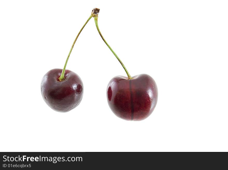 Two sweet cherries isolated on white background. Two sweet cherries isolated on white background