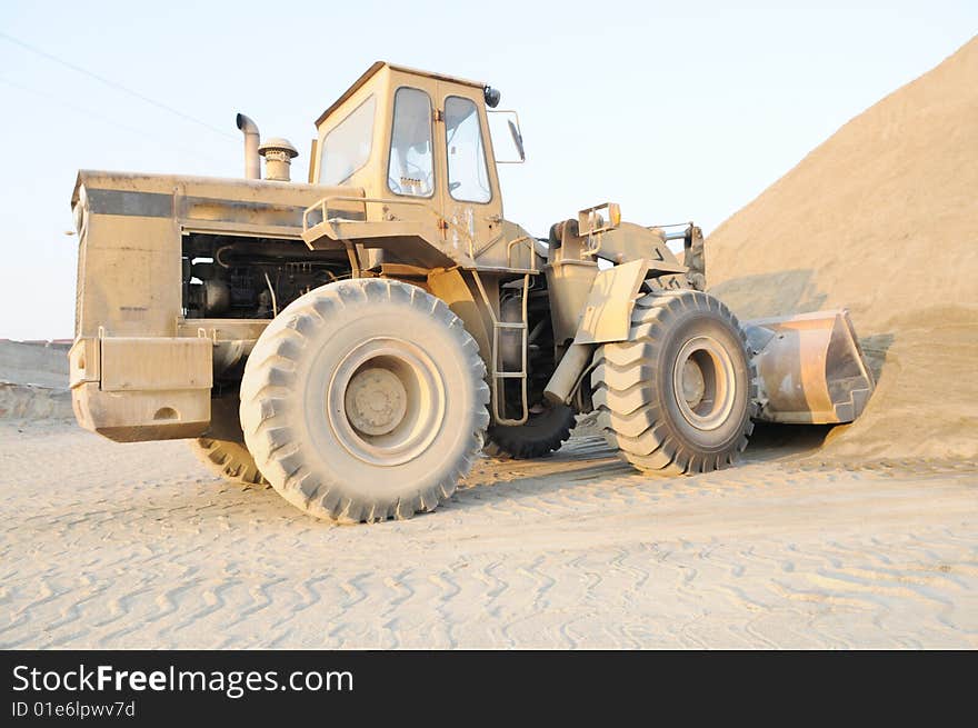 The bulldozer in the sand pit