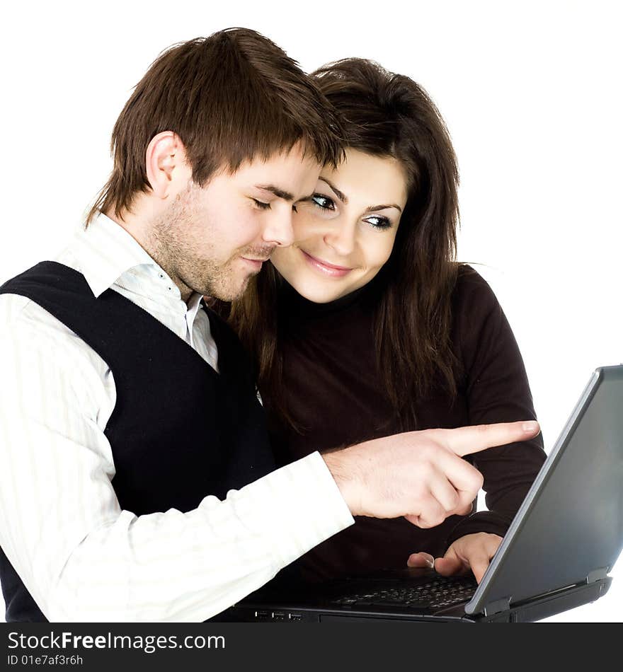 Stock photo: an image of a woman and a man with a laptop. Stock photo: an image of a woman and a man with a laptop