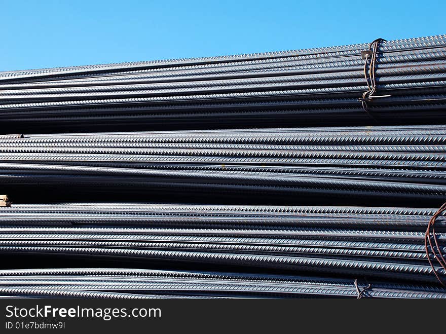 Iron armature stacks on storage outdoor background