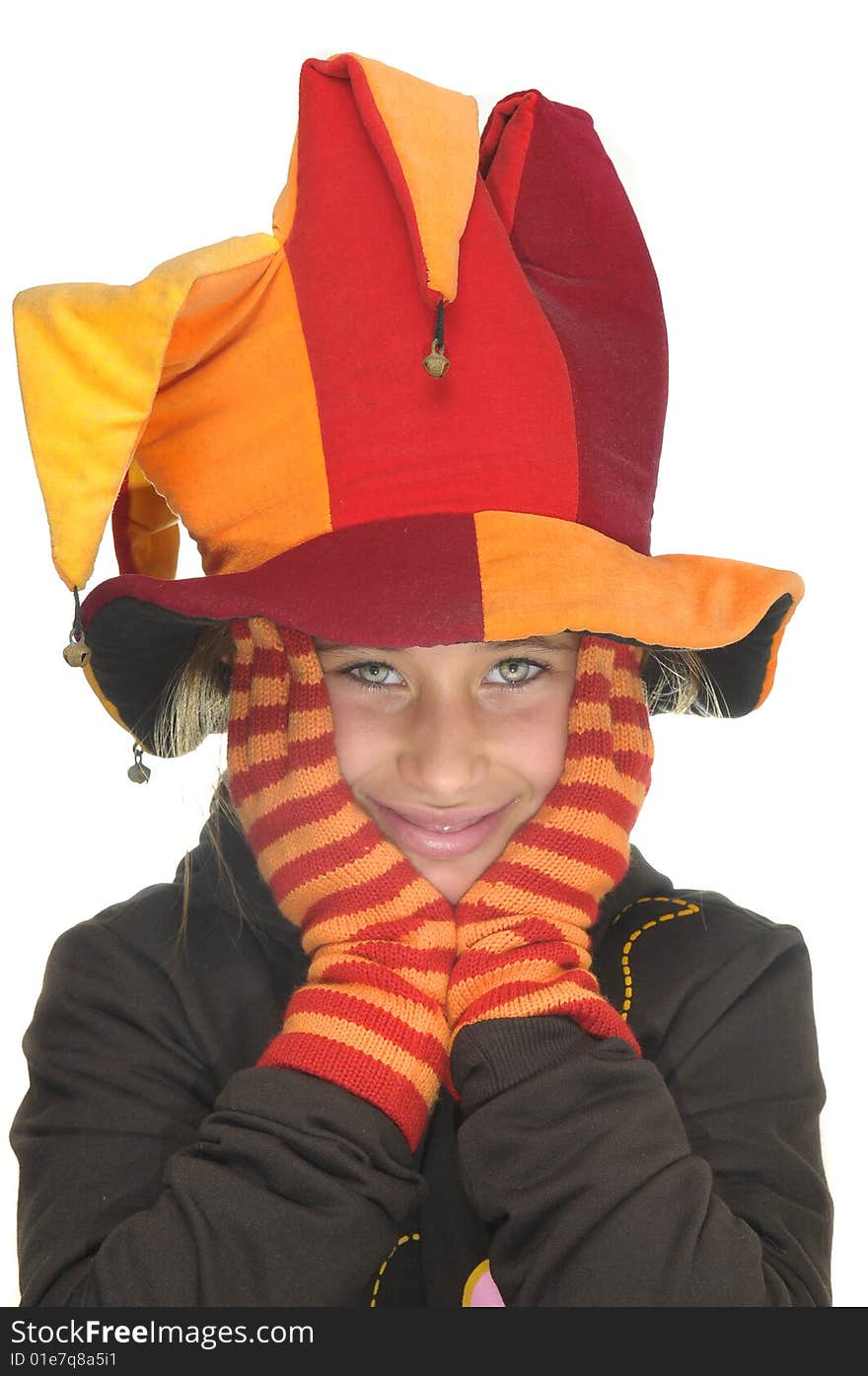 Beautiful young girl posing with gloves and hat against a white background. Beautiful young girl posing with gloves and hat against a white background