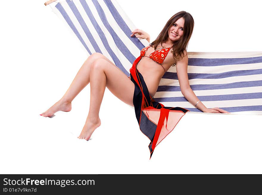 Sexy girl wearing red bikini relax on hammock