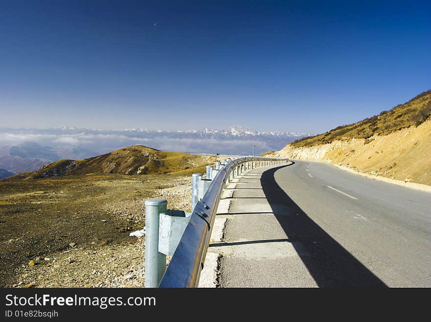 The highway of high mountain imitates a Buddha to lead to heaven. The highway of high mountain imitates a Buddha to lead to heaven