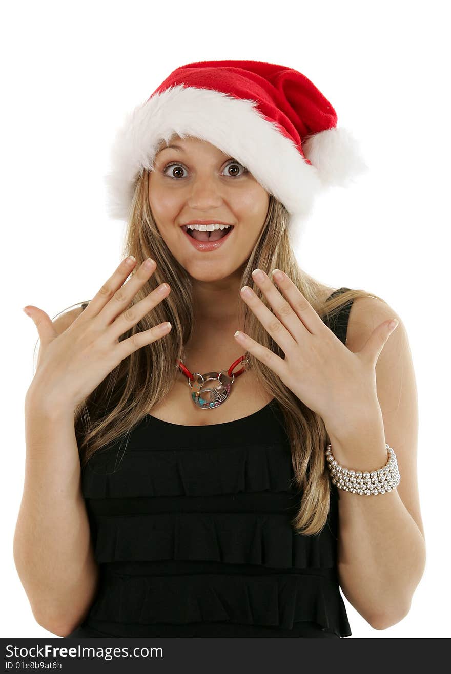 Sexy woman in a santa hat looking surprised. Sexy woman in a santa hat looking surprised