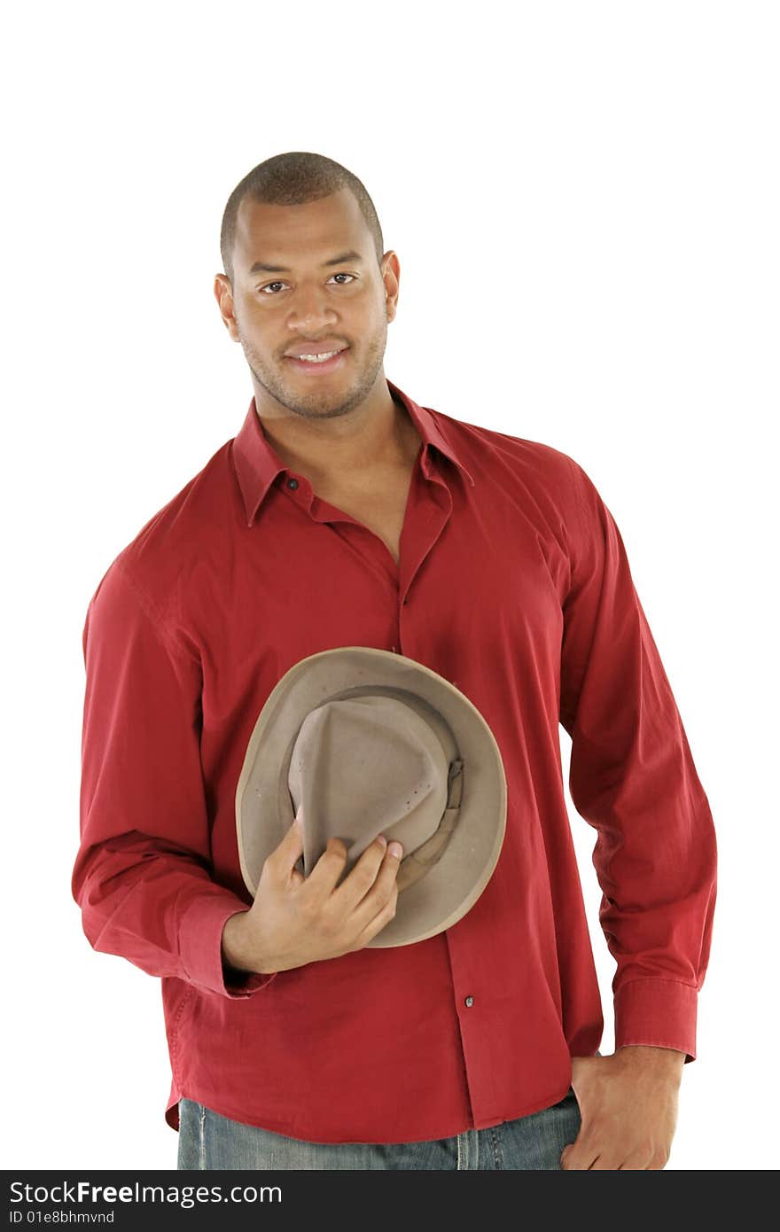 Good looking male model holding a hat. Good looking male model holding a hat