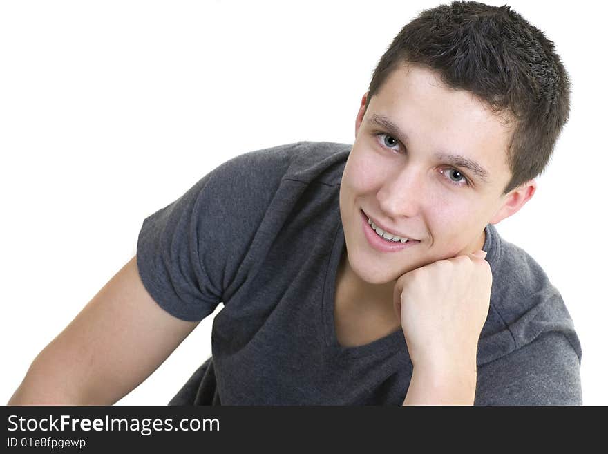 Attractive male model posing and smiling at the camera. Attractive male model posing and smiling at the camera