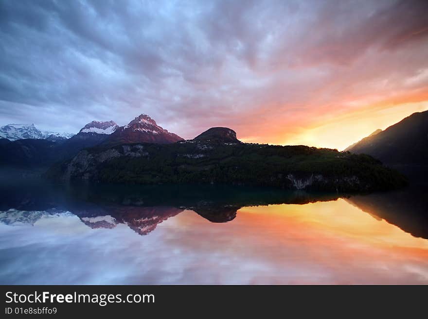 Evening sunset colorful lake and reflection. Evening sunset colorful lake and reflection