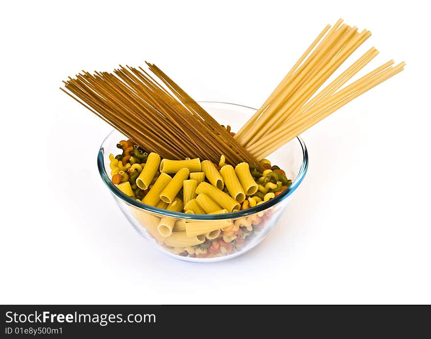 Colorful noodles in a bowl isolated on white